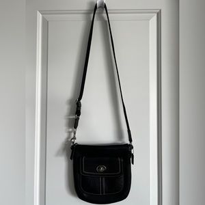 Vintage Coach cross body handbag with nickel hardware.